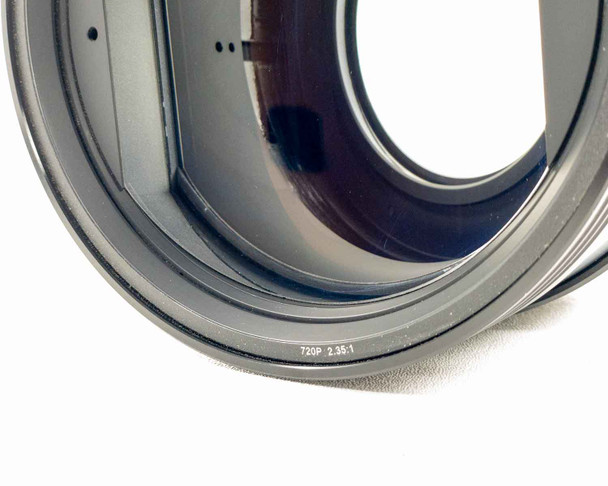 Close-up of lens rear face showing 720P 2.35:1 specification markings printed on barrel