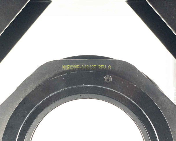 Close-up of motorized sled mount plate showing part number label MARXXMF-040485 REV A