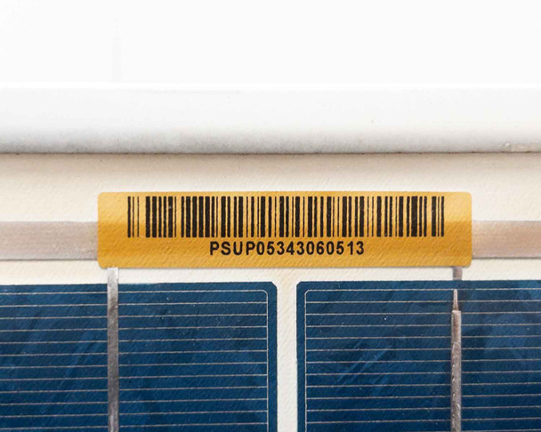 Close-up of gold barcode asset label on panel frame reading PSUP05343060513
