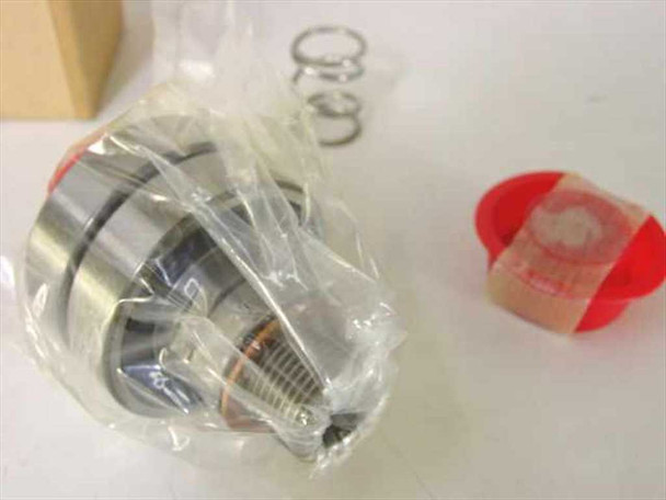 Deublin 255-000B284 Rebuild Kit — close-up of wrapped stainless rotary union cartridge with threaded fitting, coil spring and snap ring visible alongside red seal cap