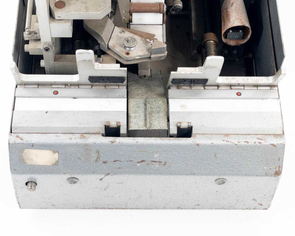Hollywood Film Company 2816 splicing mechanism top-down view showing cutting blade assembly, film guides, and rust on metal components