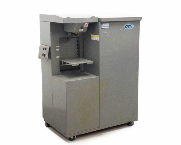 Fluid Management Accutinter 1600HS automatic paint tinter – front 3/4 view showing DVx logo, dispensing shelf, and control panel