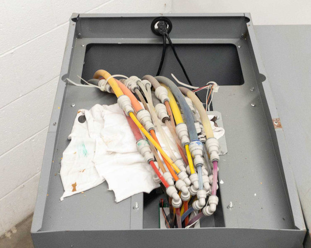 Accutinter 1600HS interior top compartment – colorant tubing bundle and wiring harness with multi-colored tubes and cloth wrap