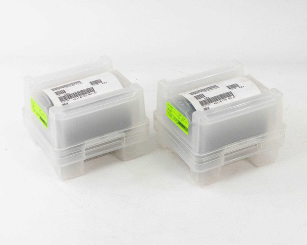 Two clear plastic wafer holder cassettes with green label tabs — closed view showing SEH America lot packaging