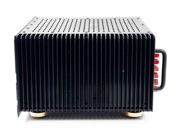 Sonance SONAMP 1250 MKII right side view showing black aluminum fin heatsink array with speaker binding posts visible at rear