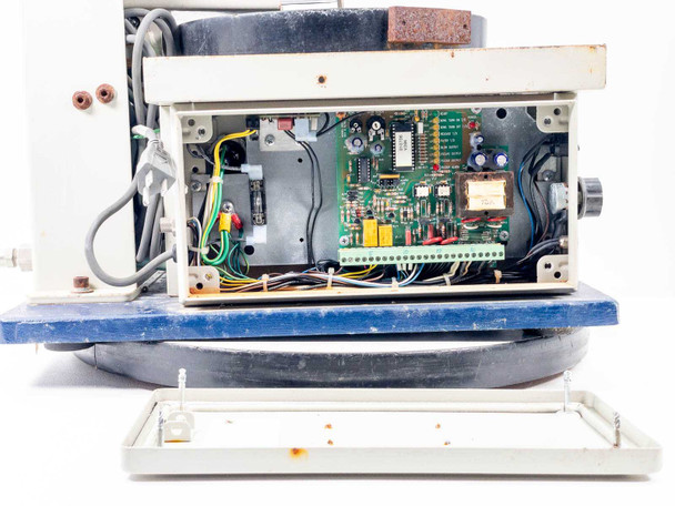 Visumatic S-18 control enclosure open showing Visumatic BASU automatic screw feeder microcomputer control board with indicator LEDs and terminal strip wiring