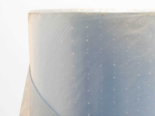 Macro view of Jura-Plast Type TL encapsulant film surface – showing texture and light blue tint with dot pattern