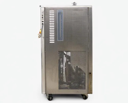 Lneya Sundi-125 left side full view showing liquid level sight glass/indicator tube on upper panel and lower condenser grill section, unit on casters