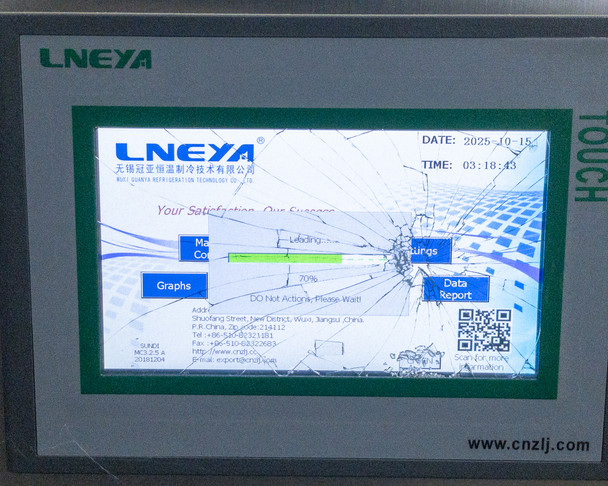 Close-up of cracked Lneya HALIO touchscreen displaying LNEYA startup screen with loading progress bar — screen glass is shattered