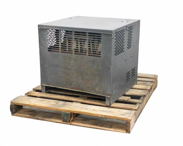 EnerSys ES3-24-850B left side view showing ventilation louvers and steel enclosure on pallet