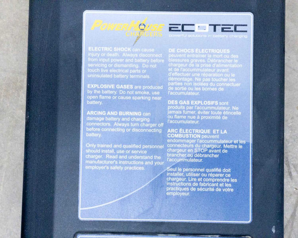 PowerHouse ACCESS 10/36/C top label panel — PowerHouse Charger and Ecotec logos with bilingual English/French safety warnings for electric shock, explosive gases, and arcing