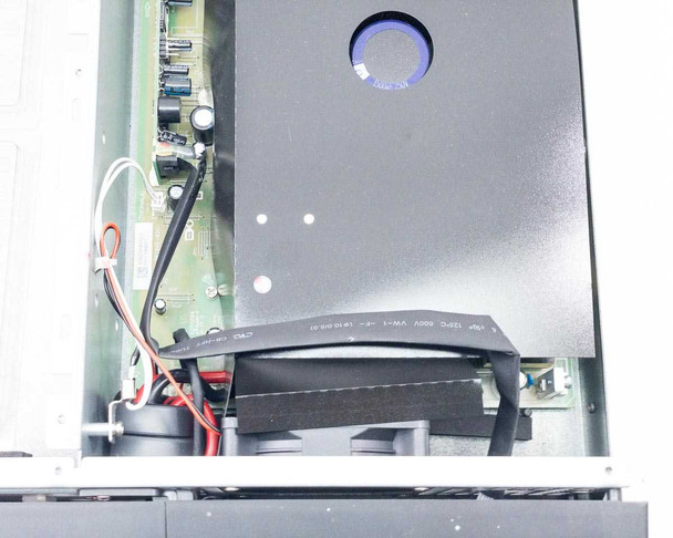 WattBox WB-UPS-1500-8 UPS — interior close-up showing battery compartment area with battery connection harness and internal fan assembly