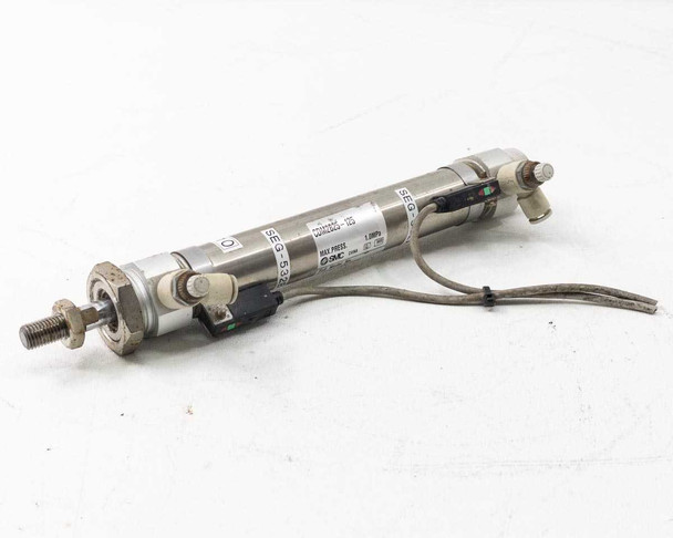 SMC CDM2B25-125 pneumatic cylinder – three-quarter view showing auto switch mounted to cylinder body with wiring