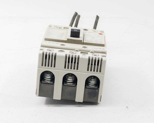 Mitsubishi NF125-CW bottom view showing three load-side terminal connection points