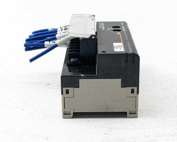 Omron CRT1-ID16 Remote Terminal Input Module – right-side profile view showing DIN rail mount channel and module depth