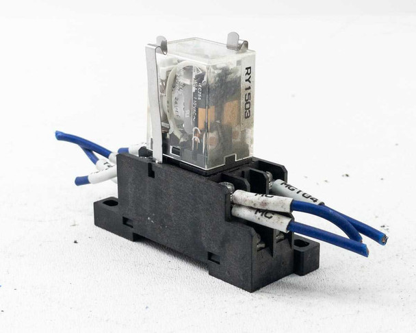 Omron LY2N-D2 relay on PTF08A base showing light soil and wear on socket body – front-left view