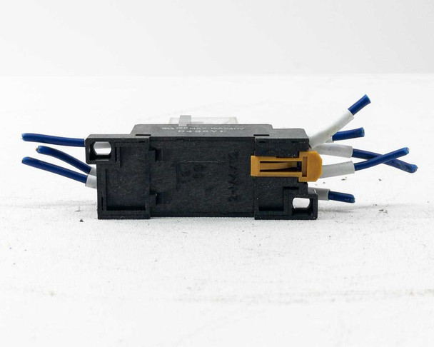 PTF08A relay socket base underside view showing screw terminals, wired leads, and orange jumper tab