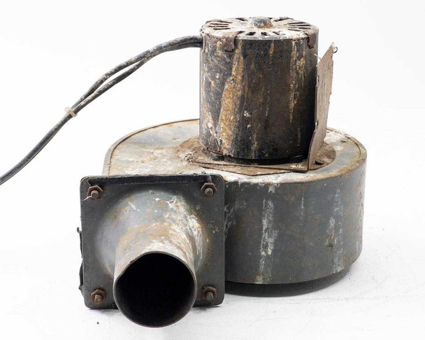 Torrington Electric centrifugal blower — front-left angle view showing full power cord exiting motor top, round tube outlet detail, and rust-heavy motor casing with paint flaking