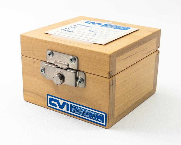 CVI Laser Corporation wood storage case exterior showing CVI label and original customer order form on lid