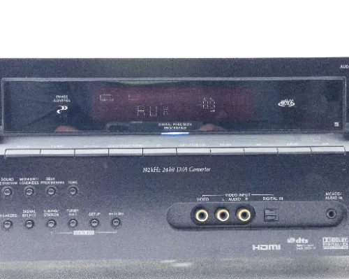 Pioneer VSX-917V-K front panel close-up showing 192kHz 24-bit D/A Converter label, HDMI badge, Dolby and DTS logos, and video input section