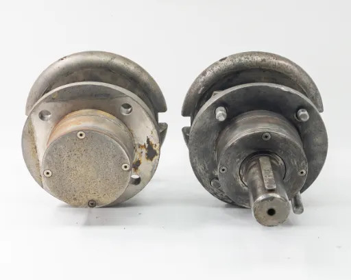 Minply MFO-74 Circular Safety Chuck pair – bottom/rear view showing both units with shaft ends, flange backs, and overall condition