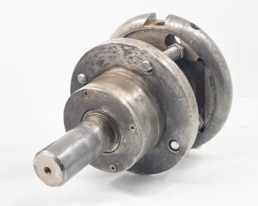 Minply MFO-74 Circular Safety Chuck – three-quarter angled view showing full shaft, flange, and circular housing