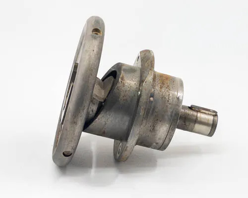 Minply MFO-60 circular safety chuck — flange side view showing flat flange face with mounting holes and light surface rust