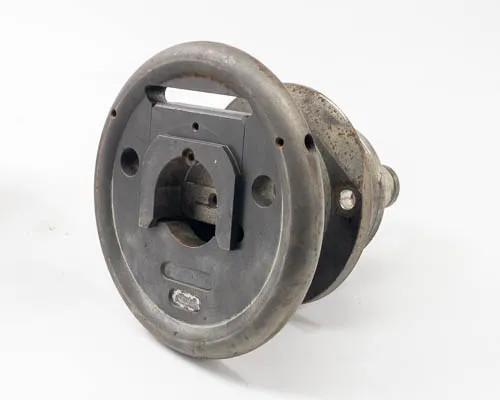 Minply MFO-60 circular safety chuck — angled rear view showing square drive socket, mounting holes, and shaft stub