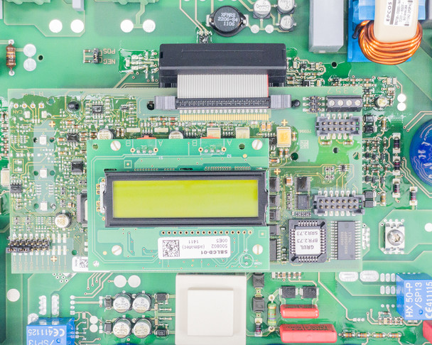 SMA SB3000US PCB close-up — main processor area with LCD module (board label BRLGB-01) and microcontroller ICs