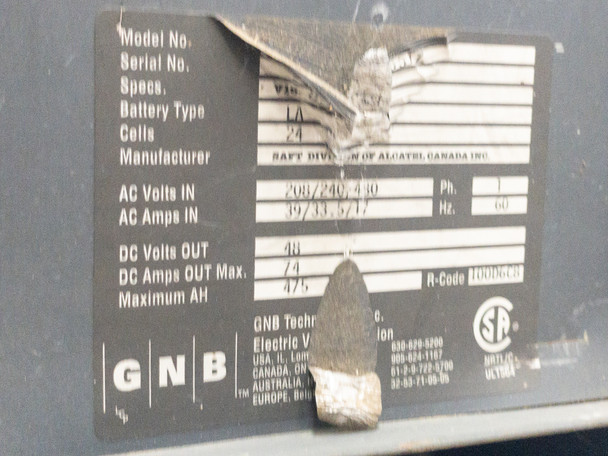 GNB SCR100-24-475T1Z nameplate label showing model number, battery specs (24V, 12 cells), AC input (208/240/480V, 3Ph, 60Hz), DC output (48V, 74A, 475AH), and SAFT Division of Alcatel Canada manufacturer info