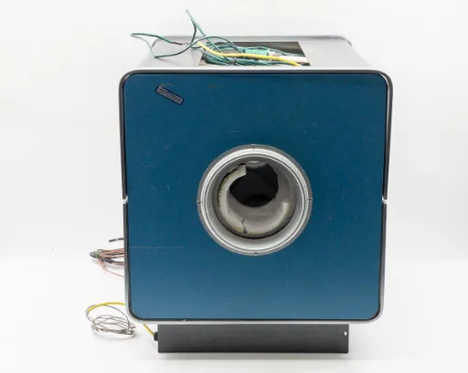 Lindberg 54434 Hevi-Duty Tube Furnace left side view showing blue panel, circular tube opening, and loose wiring leads hanging from base