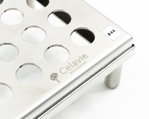 Celavie Biosciences logo etched on stainless steel test tube rack side panel — asset tag #44 visible on rack end