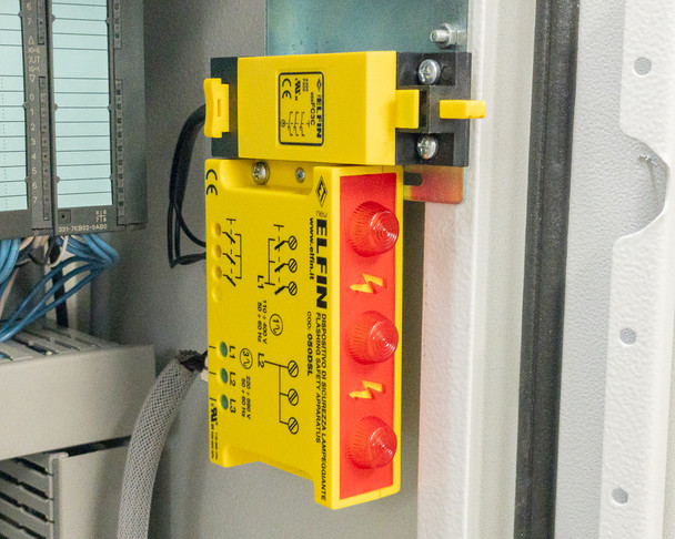 Electrical cabinet detail — Siemens contactors, ELFI interlock safety system, and power distribution