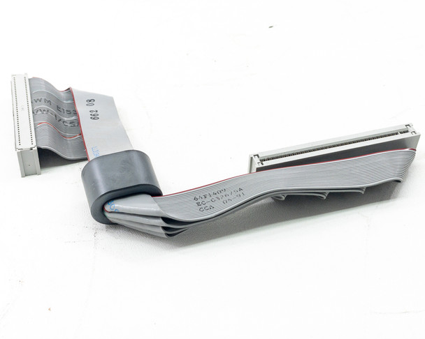 IBM 64F1409 ESDI hard drive ribbon cable – full cable assembly angled view showing both connectors and strain relief