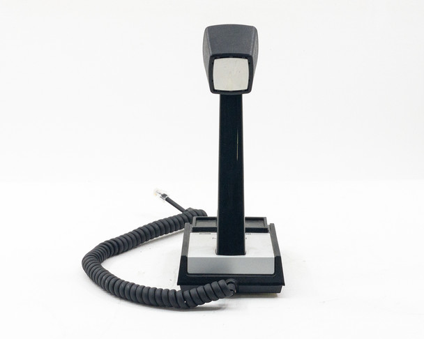Shure Brothers XTBM694EF microphone front view showing chrome-accent base and coiled RJ cable at left