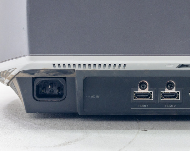 Sony VPL-VW50 — left-side profile view showing rear port cluster, ventilation grille, and AC inlet