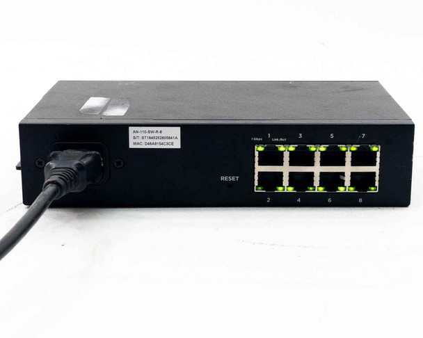Araknis AN-110-SW-R-8 – rear panel view showing IEC C14 power inlet, 8 RJ-45 gigabit ports, reset button, and model/MAC label