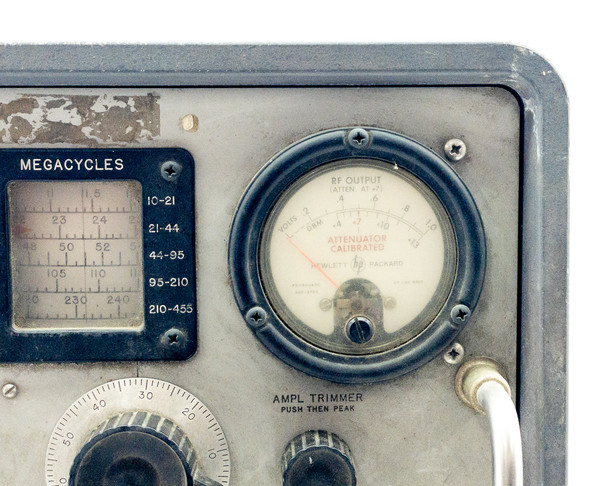 HP 608F VHF Signal Generator – close-up of manufacturer data plate reading Model 608F, 115/230 Volts, 50-400 Cycles, Hewlett Packard Made in USA, with visible patent numbers