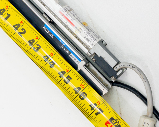 Keyence SL-V60H safety light curtain measured against tape measure showing approximately 46-inch total length