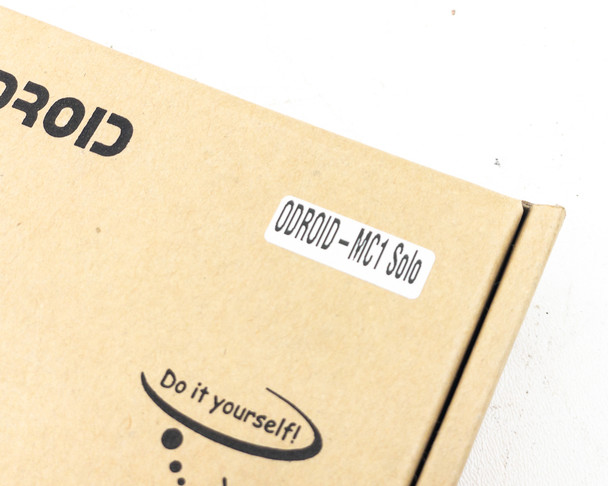 Close-up of ODROID-MC1 Solo box label reading ODROID-MC1 Solo on brown cardboard packaging