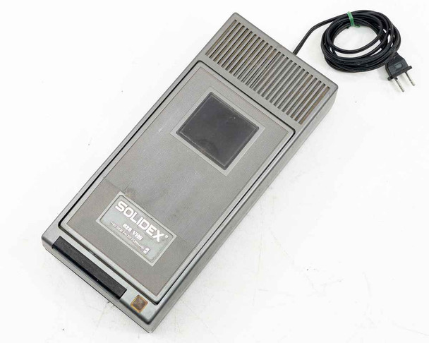 Solidex 828 VHS Video Cassette Rewinder – top-front angle view showing Solidex label and tape slot with AC cord