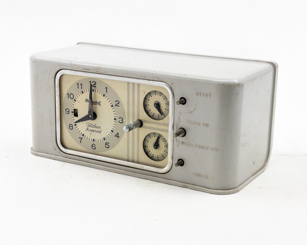 GE Hotpoint 3T38AAA1 Type T-38 Electric Range Timer – front-left three-quarter view showing clock face and two sub-dials