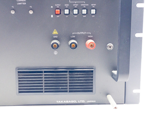 Close-up of Takasago BWS 40-15 lower front panel showing GND, LOW, and HIGH output binding posts and mode/offset/operation toggle switches