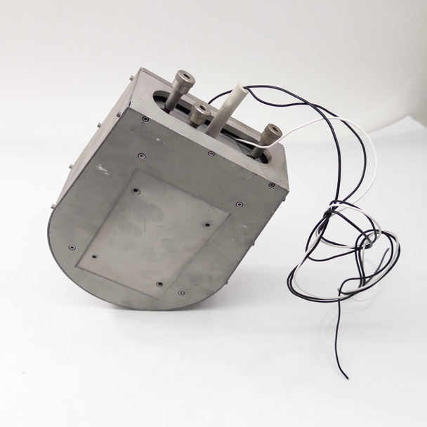Wafer process chuck – angled rear view showing D-shaped stainless enclosure with finned sides, perimeter screws, two top fittings, and trailing black and white wiring