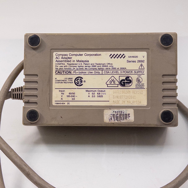 Compaq Series 2692 AC Adapter bottom label showing AA16020 model number, Series 2692, input 100-240V 50/60Hz 0.8A, output 5V 2A and 6.8V 0.625A, made in Malaysia, certifications UL CSA GS