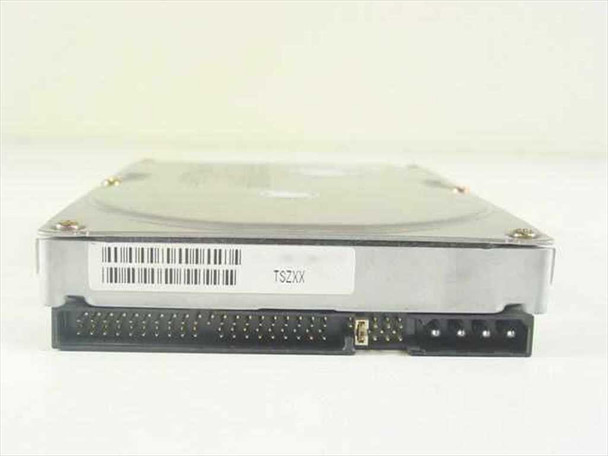 Quantum Fireball 7.5AT — front edge view showing 40-pin IDE data connector, 4-pin power connector, and jumper block with TSZXX label