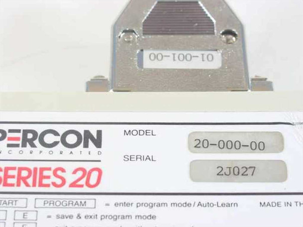 Percon Series 20 label showing Model 20-000-00 and Serial 2J027 with included cable connector and programming guide