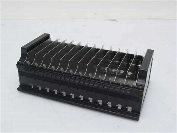 Compaq 29917-002 DAT 12-slot autoloader cartridge magazine tray – angled top-front view showing all 12 cartridge slots with wire retainer clips