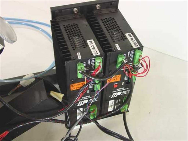 Pair of Applied Motion Products Si5580 step motor drivers mounted in black chassis — front terminal and wiring view