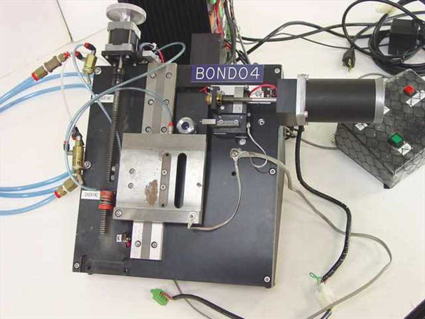 AMC Bondo4 linear slide assembly closeup — BONDO4 label visible, stepper motor, fine-thread lead screw, and linear bearing stage